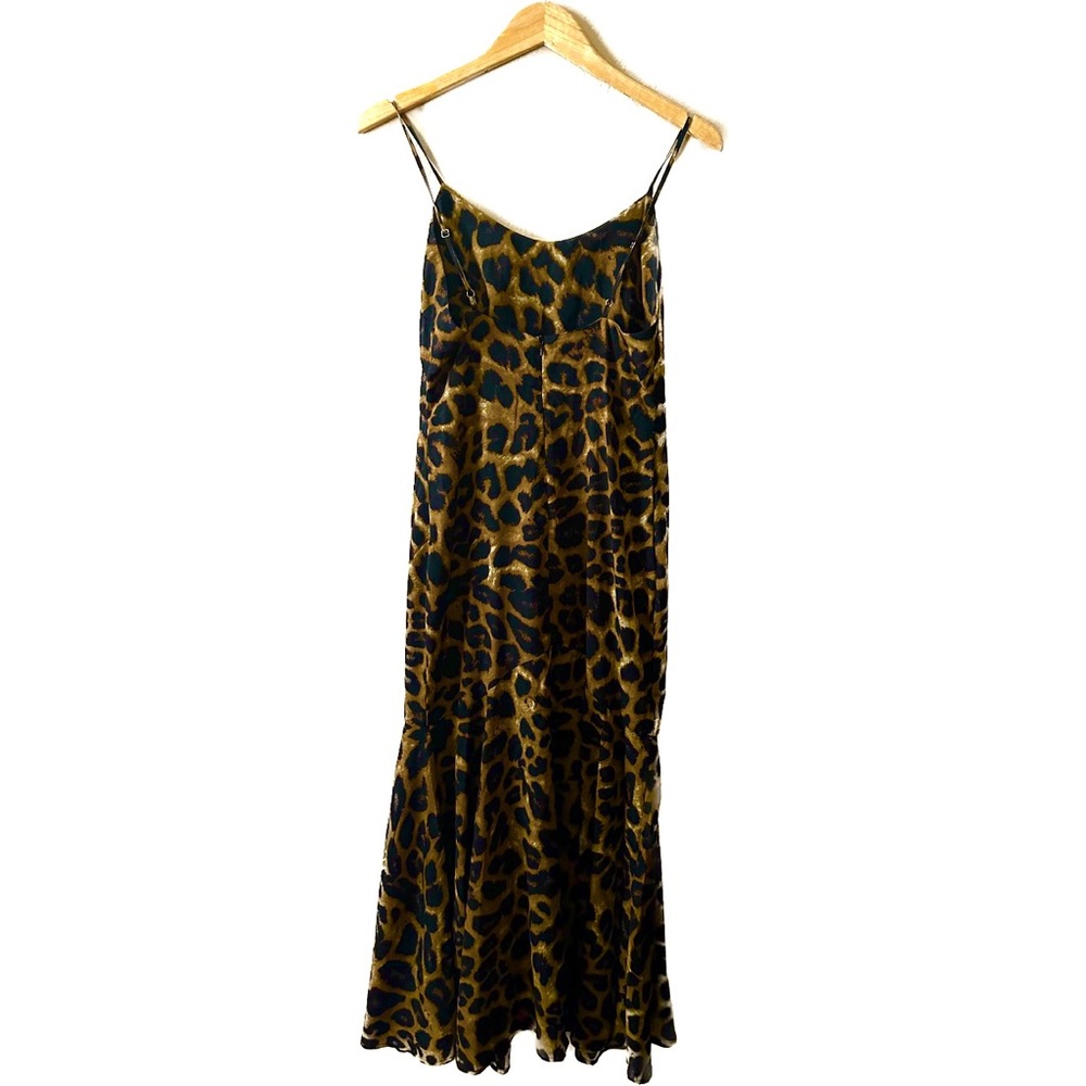 Long leopard print dress with a slight bell at the bottom.